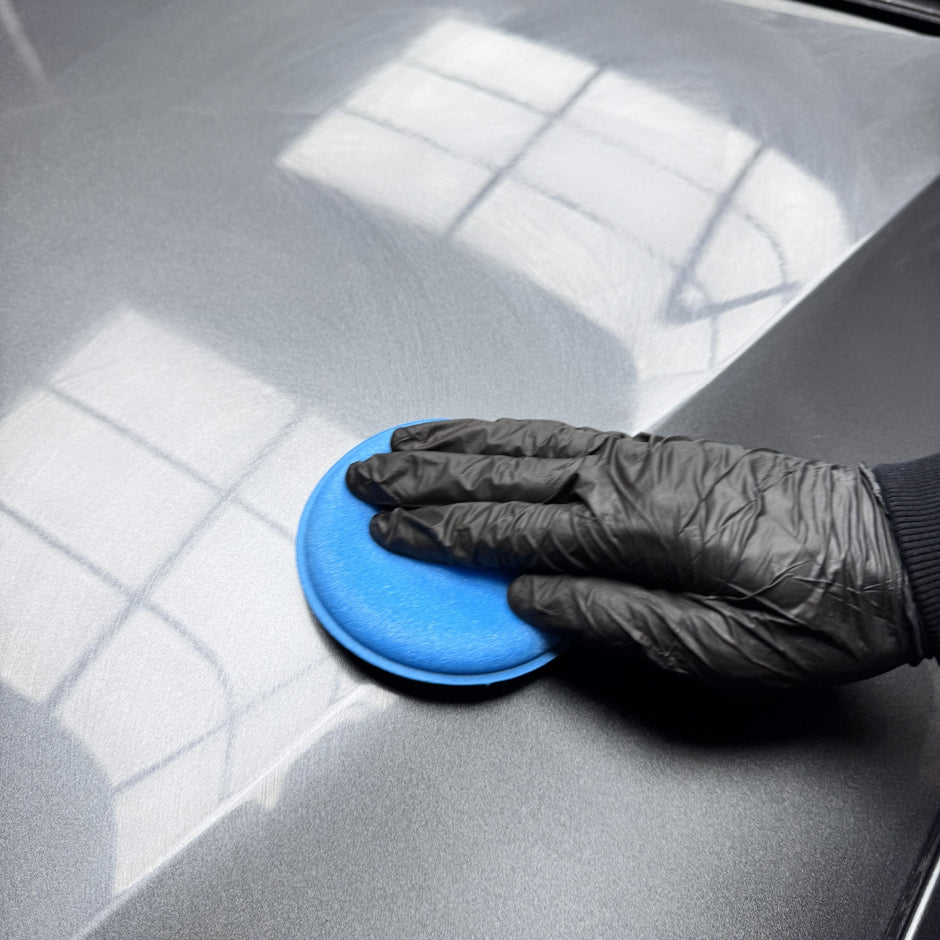 Set of five Prismax foam polishing pads for car paint correction and polishing, showing the soft, round foam applicators.
