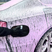 Ultra-soft synthetic wool wash mitt by Prismax for car care, designed for gentle, effective cleaning of vehicle surfaces.