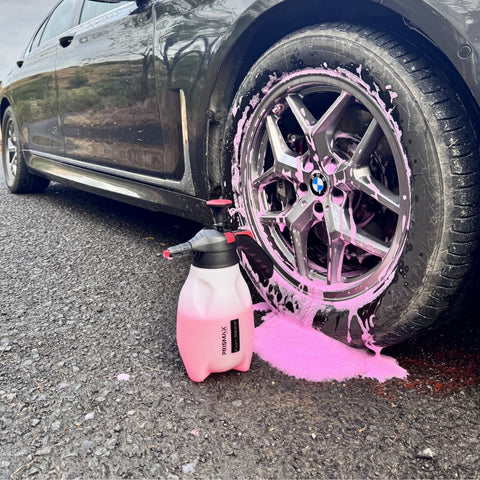 Foam Meister foam cannon by Prismax Car Care Products mounted on a car, ready to spray thick foam for cleaning and detailing.