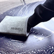 Prismax ClayMitt decontamination mitt for car detailing, showing a soft, textured clay mitt used for removing contaminants from vehicle surfaces.