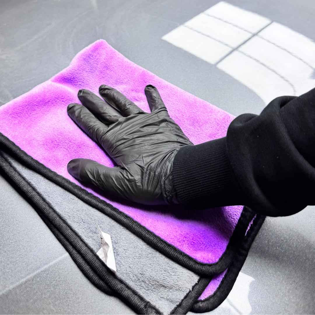 Two Prismax microfibre towels, 40x60cm, ultra-absorbent 600 GSM mid-weight towels, shown folded for car cleaning or drying.