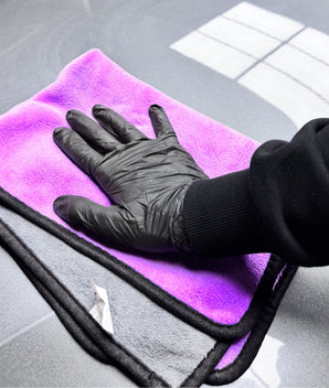 Two Prismax microfibre towels, 40x60cm, ultra-absorbent 600 GSM mid-weight towels, shown folded for car cleaning or drying.