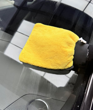 Prismax GlassMitt for streak-free glass cleaning, showing the microfiber mitt with a close-up of glass surface for car window cleaning.