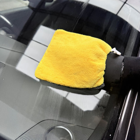 Prismax GlassMitt for streak-free glass cleaning, showing the microfiber mitt with a close-up of glass surface for car window cleaning.