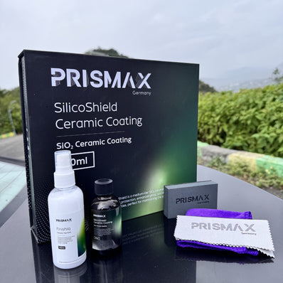 Prismax SilicoShield ceramic coating applied to a car's hood, showcasing a smooth, glossy finish for durable paint protection.