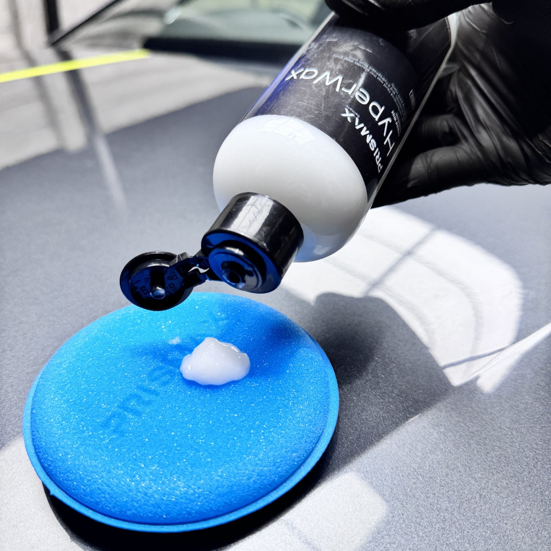 Set of five Prismax foam polishing pads for car detailing, perfect for applying polish or wax on vehicle surfaces.