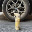 TyreBliss Tire Shine Spray by Prismax, 500ml, water-based formula, showing a car tire with a glossy, clean finish.