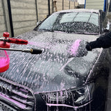 Prismax PlushWash car shampoo bottle with label, showcasing a pre-cleaner for vehicle washing and detailing.