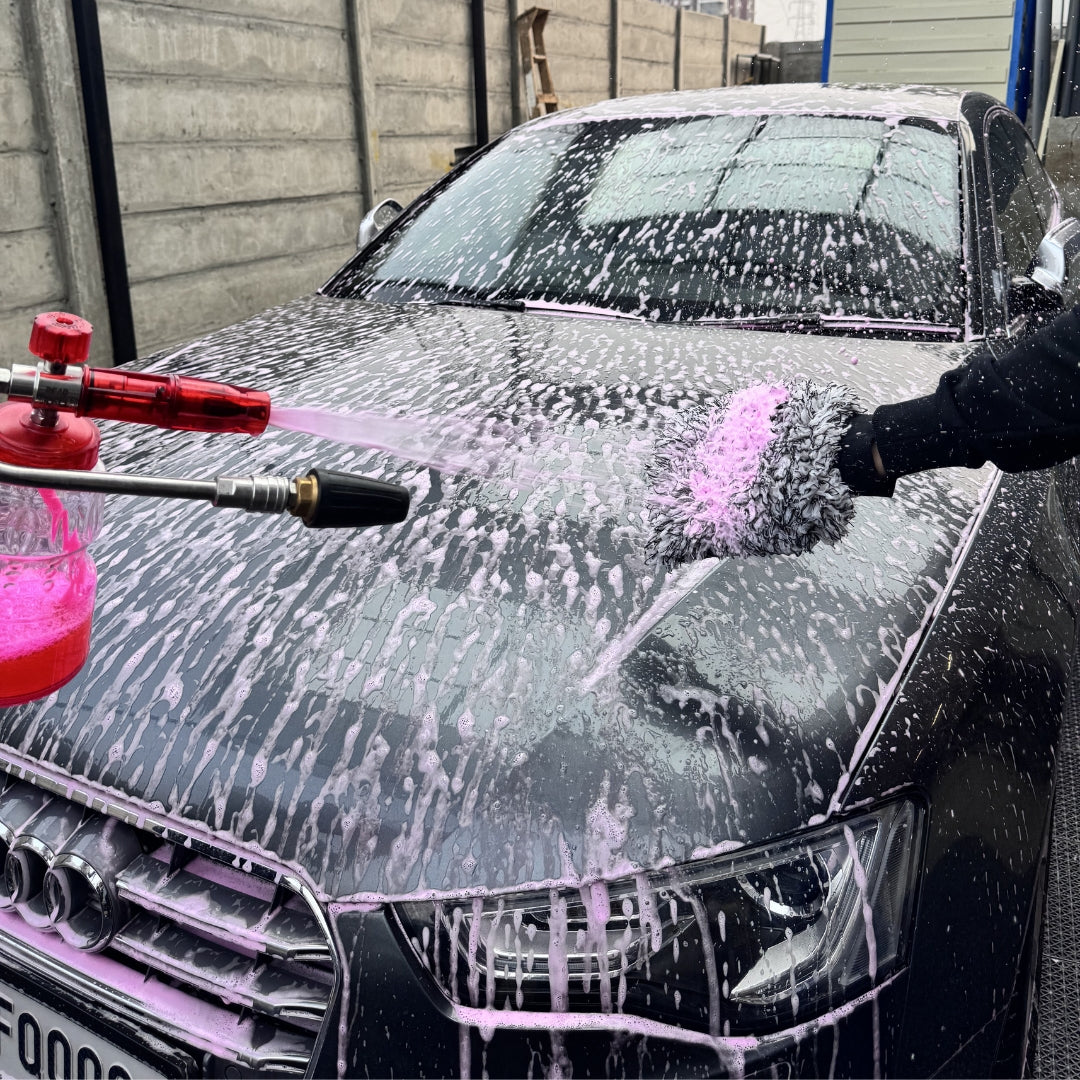 Prismax PlushWash car shampoo bottle with label, showcasing a pre-cleaner for vehicle washing and detailing.