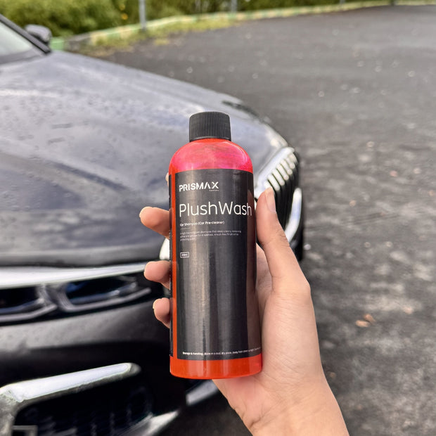 Prismax PlushWash car shampoo bottle with label, showcasing a pre-cleaner for vehicle exterior cleaning and pre-washing.