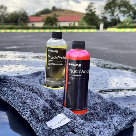 Prismax PlushProtekt pH Neutral Car Shampoo for ceramic and PPF surfaces, showing a shiny, clean car being washed with suds.