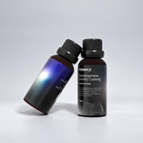 Two bottles of Prismax TitanGraphene ceramic coating for car care, showcasing premium graphene ceramic protection product.
