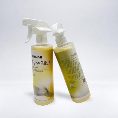 Close-up of TyreBliss tire cleaner by Prismax, showing a clean, shiny black car tire with the product bottle nearby.