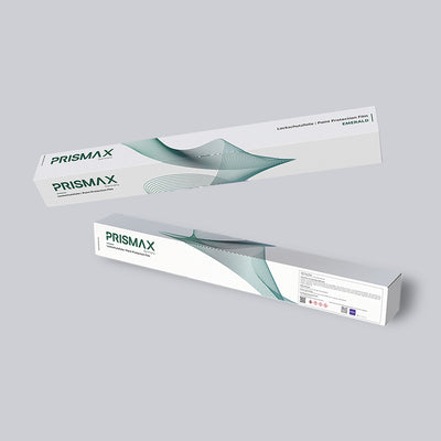 Close-up of Prismax Emerald Paint Protection Film (PPF) applied to a vehicle's surface, showcasing its clear, glossy protective finish.