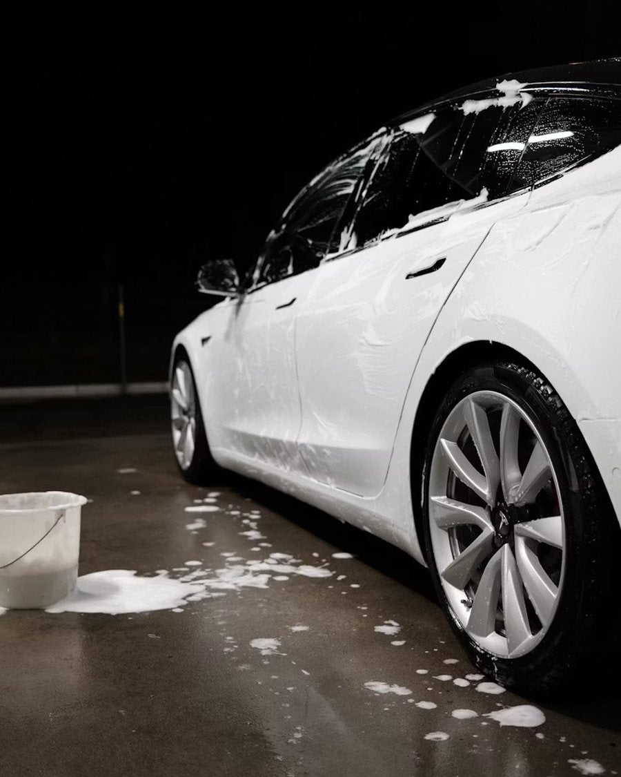 Freshly washed car in a detailing bay