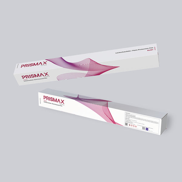 Ruby Paint Protection Film by Prismax shown on car surface, highlighting glossy red finish and protective film application.